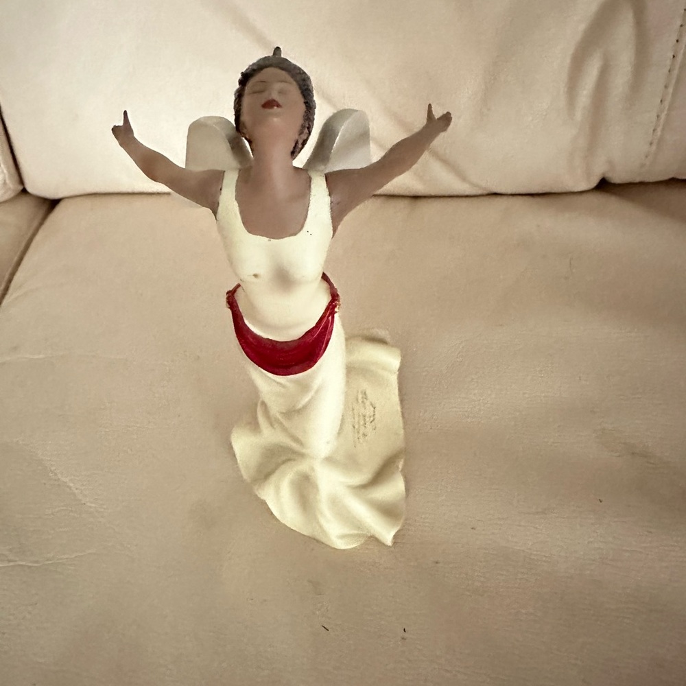 Elegant Angel Figurine with Red Sash
